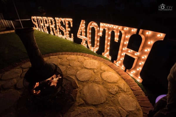 LED light up letters at a surprise 40th birthday.