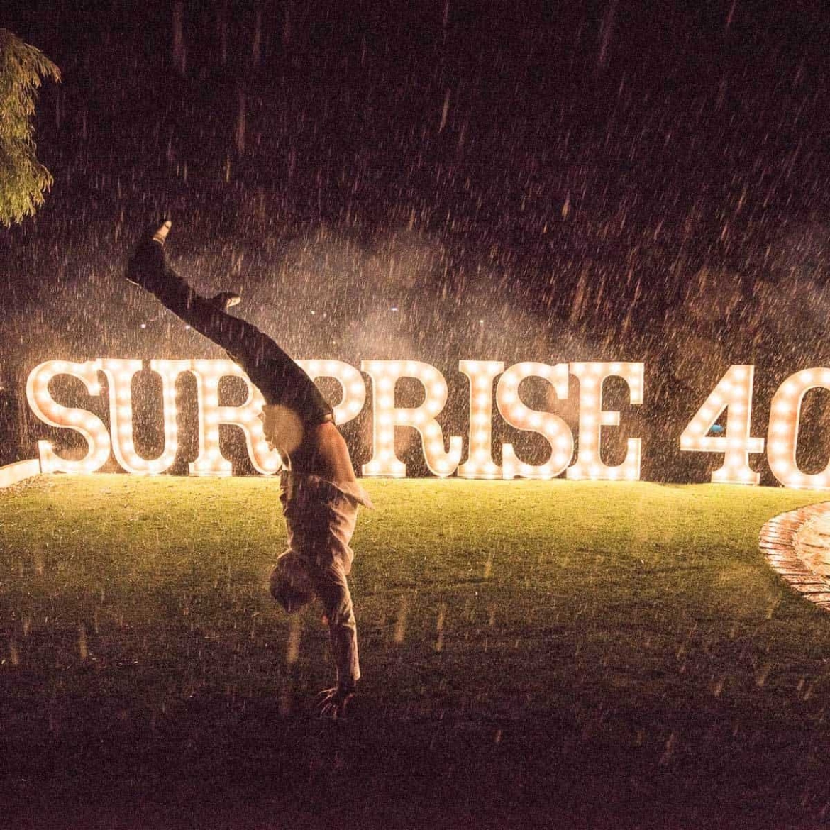Giant-letters-on-lawn-in-rain.jpg
