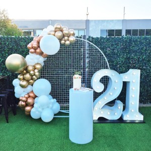 Giant number lights and gold balloons for a 21st birthday party, at Badlands Bar in Perth.
