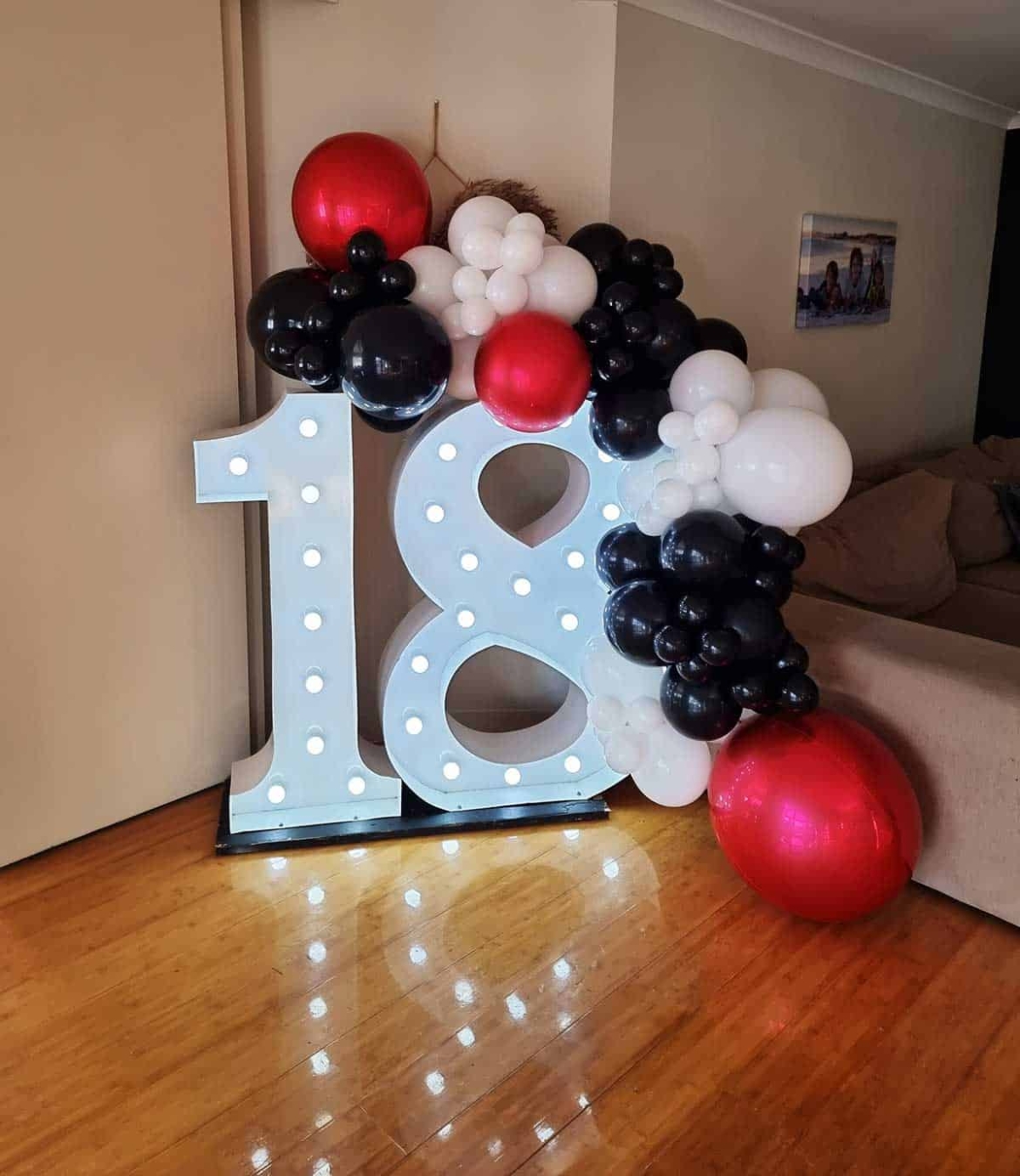 Giant-number-lights-with-red-balloons.jpg