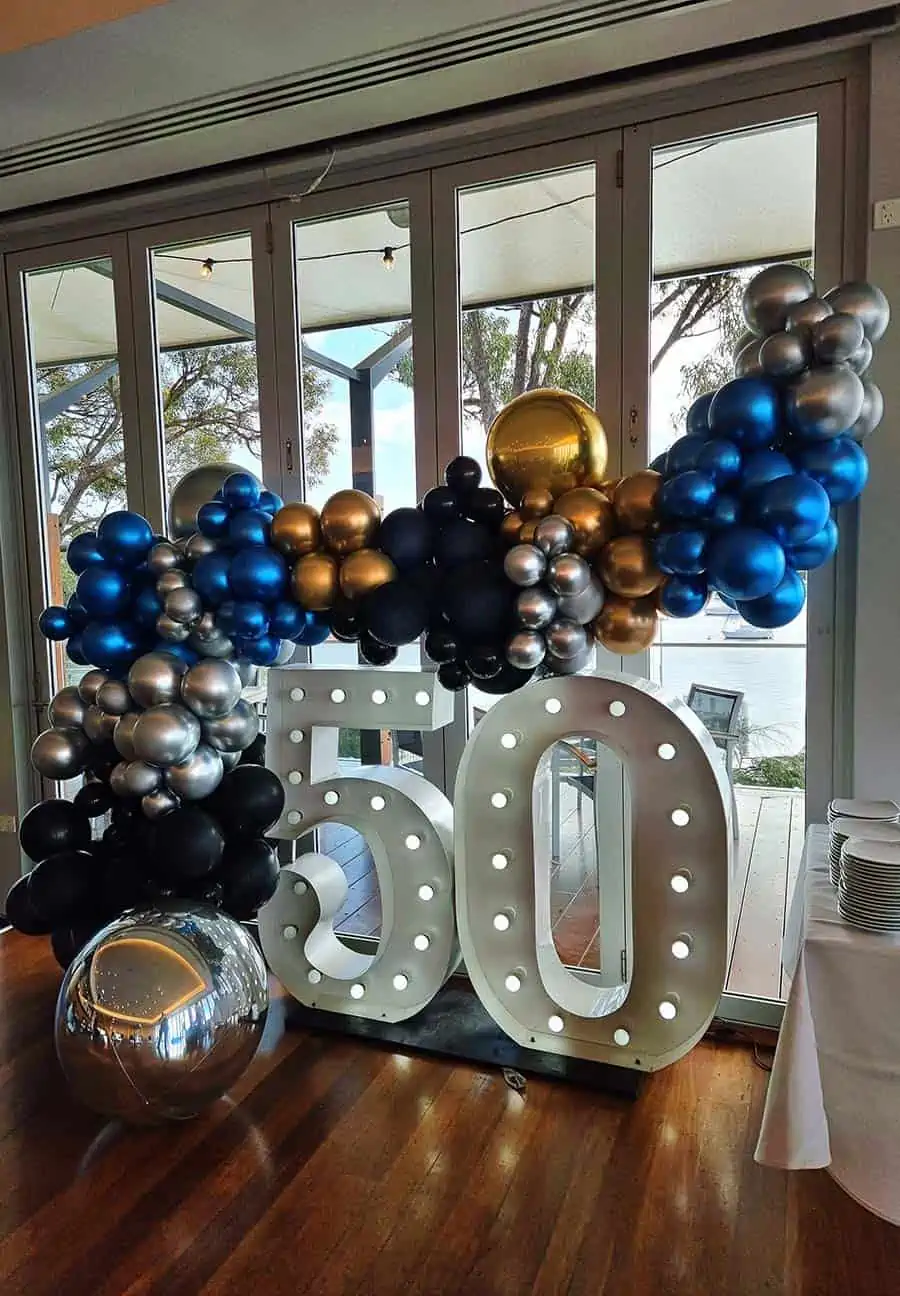Giant-number-lights-with-silver-balloons.jpg