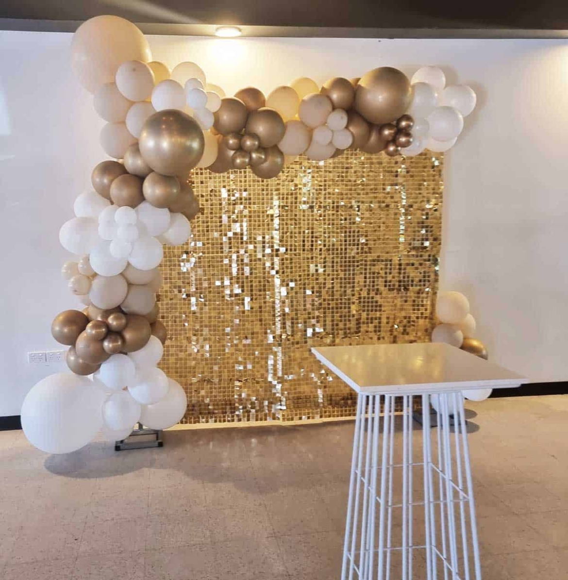 Shimmer-wall-and-gold-balloons.jpg