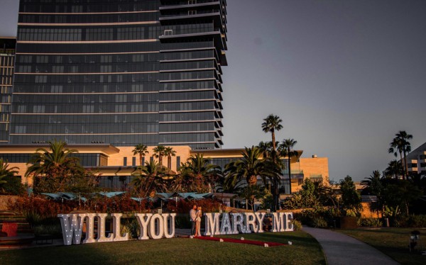 WILL YOU MARRY ME light up letters at a hotel in Perth.