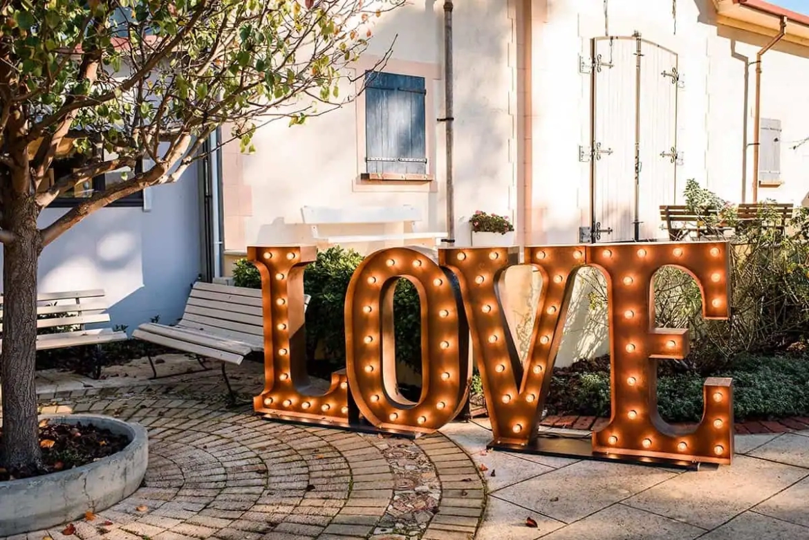 Giant-light-up-love-letters-Barrett-Lane-Open-Day.webp
